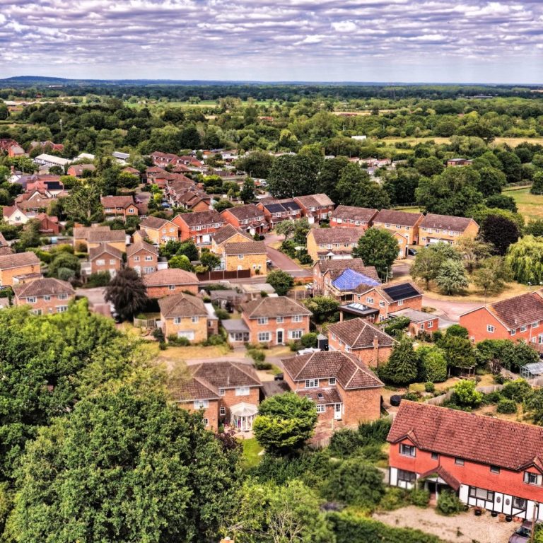 Residential Properties Supported by Altivis Aerial view of residential properties and surrounding landscape representing the types of homes and communities Altivis supports.